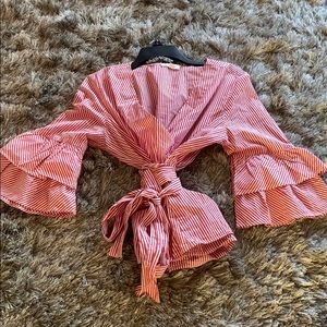 Wrap top with tiered bell sleeves